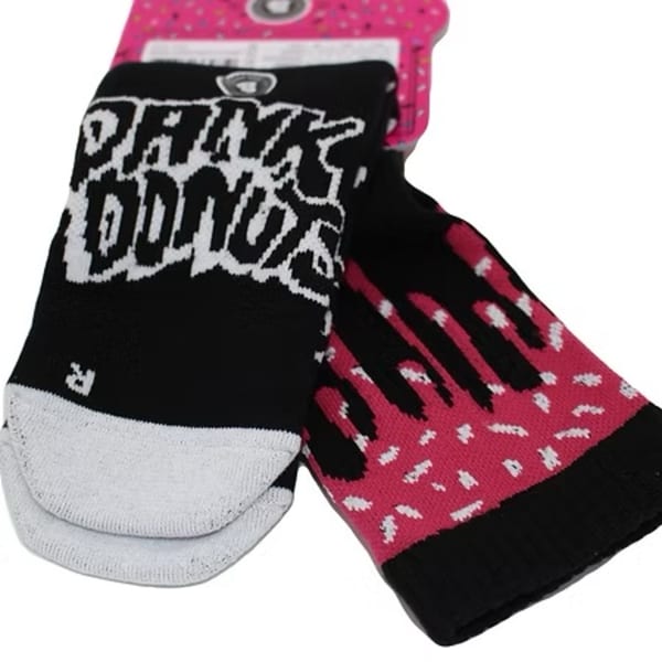 Pair of Dank Donuts socks, one black with white text, the other pink with black drip design.