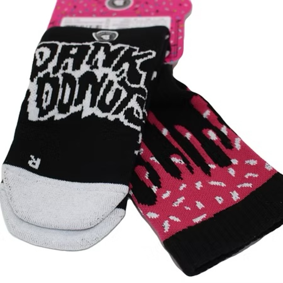 Pair of Dank Donuts socks, one black with white text, the other pink with black drip design.