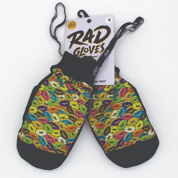 Pair of black Rad Gloves with a colorful donut pattern, displayed with their tag.